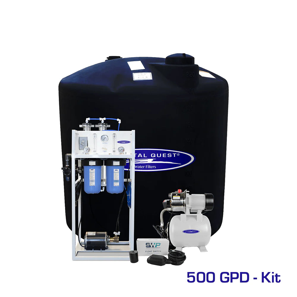 Crystal Quest 500 GPD commercial RO system with white frame, blue filters, brass pump, and 220-gallon black storage tank.