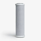 Crystal Quest 5-Micron Carbon Block Filter Cartridge, 2-7/8” x 9-3/4”, with white end caps.