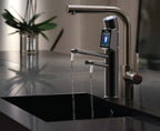 Tyent UCE-13 PLUS Matte Black built-in water ionizer faucet dispensing water in modern kitchen