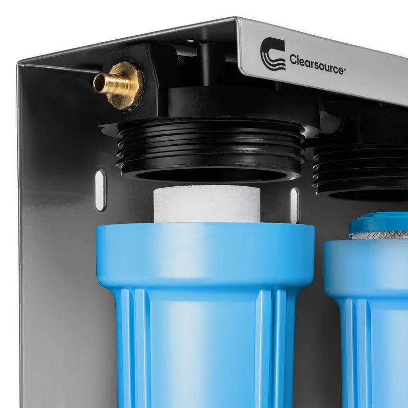 Close-up of an exposed cartridge and open blue housing on the Clearsource Ultra OnBoard Pro RV water filter system.
