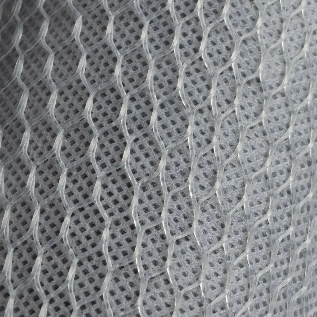 Close-up of the white polypropylene netting and polyolefin casing of a Crystal Quest 5-Micron Carbon Block Filter.