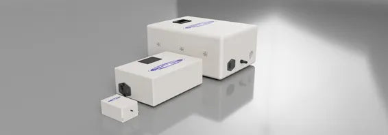 Three white Crystal Quest OxiOrg ozone systems in varying sizes for whole-home water oxidation.