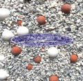 Crystal Quest Ionizer Multimedia: Natural mineral blend of white ceramic, red tourmaline, and grey infra-red balls.