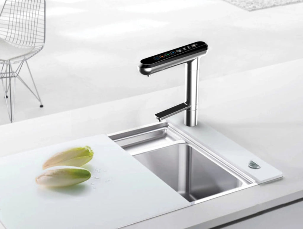 Water for Life IonPlus UD-3000 digital water ionizer faucet installed beside a modern kitchen sink.