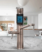Tyent UCE-13 Plus Antique touchscreen water ionizer faucet shown on a marble kitchen countertop